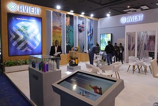 How does a good exhibition stall design promote brand awareness?