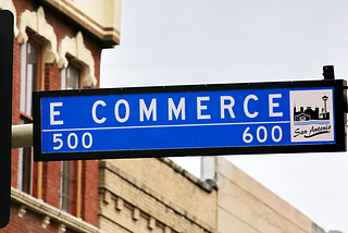 Photograph of E Commerce avenue traffic sign, courtesy Mark König on Unsplash