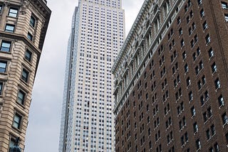 Image of the Empire State Building, image credit Adobe Stock. https://stock.adobe.com/images/view-looking-up-of-the-empire-state-building-seen-from-herald-square-new-york-city-united-states/280146426?prev_url=detail&asset_id=280146426