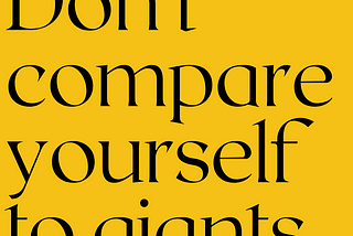 Black text on a yellow background reads, “Don’t compare yourself to giants.”