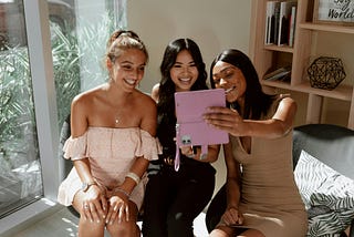 Three women taking a selfie