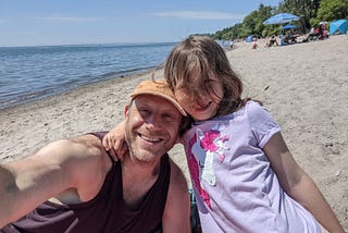 Picture of George and Aliyah together on the beach