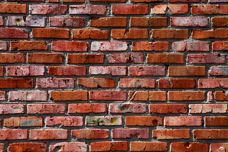 a graphic with a brick wall
