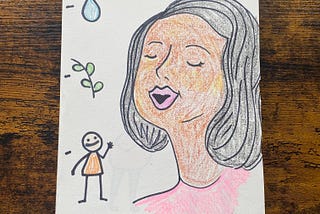 A woman speaking, with three emojis: a raindrop, a green olive branch segment, and a smiling person waving