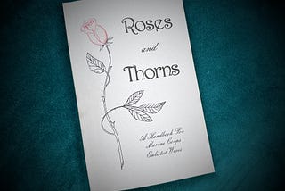 Roses and Thorns booklet with teal background