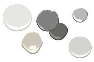 A collection of monochrome colored circles on a white background
