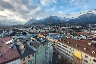 View of the city of Innsbruck and the mountains behind it, taken from the top of the city’s historic tower.