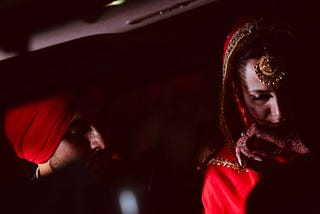 Bride wiping off tears during the Bidai ceremony.