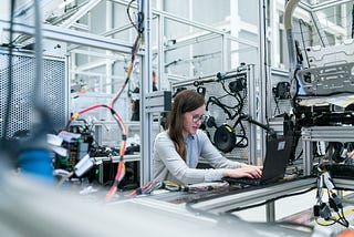 A girl on a factory shop floor