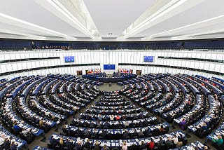 A large white circular room that houses all the European Union’s representitaves.