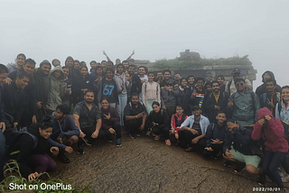 Group photo of the morning sunrise trekkers at Skandagiri.