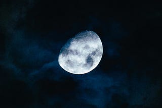 bright moon against the night sky