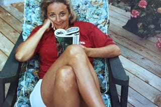 My mother Larieta at my childhood home, early 1970s, reading Cosmopolitan.