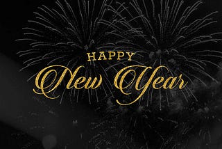 Free Happy New Year graphic in black and gold. Orlando T White