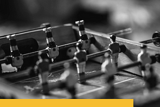 black and white foosball table