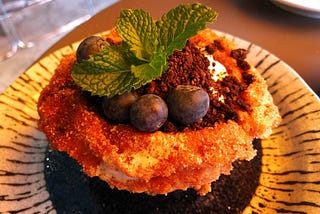Freshly Fried Churro Cup filled with blueberry, oreo, and cream cheese at Nonsense Cafe & Bar