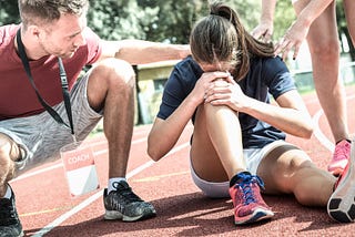 female-athlete-getting-injured-during-athletic-run-training — Un Swede