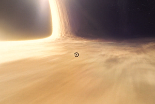 The space-craft Endurance zooms around the event horizon of the black hole, Gargantua