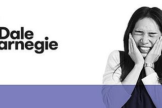 Dale Carnegie banner photo includes a girl pulling a face!