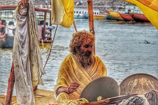 Pandit worshipping Holy River, Ganga.