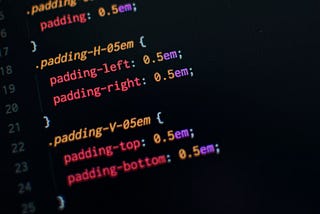 Computer monitor showing CSS code.