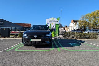 Vauxhall Corsa-E charging at Lidl using a PodPoint charger.