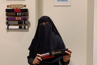 Muslim woman black belt martial arts