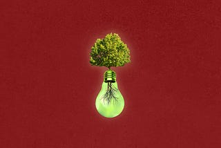 A green idea tree with a textured dark red background.