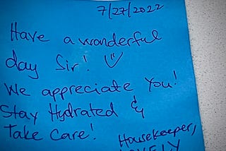 Handwritten sticky note from a Marriott housekeeper saying, “Have a wonderful day, Sir! We appreciate you! Stay hydrated and take care.” Signed: Housekeeper, Lovely