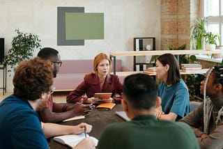 Overcoming Challenges in Hybrid Meetings via Hybrid Conference Rooms