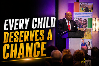 Dominic Carter keynote speaker on child advocacy and resilience speaking to audience in Kansas