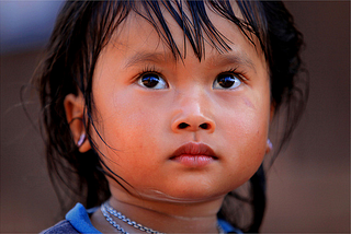Phunoi ethnic girl in the village of Ban Dong, northern Laos