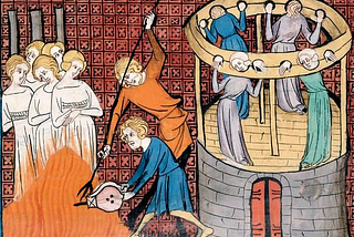 Medieval image of witches being executed