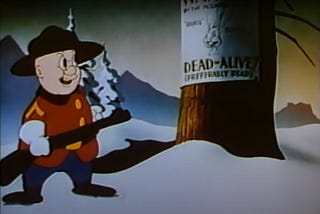 Elmer Fudd with a rifle reading a “wanted dead or alive” sign about Bugs Bunny