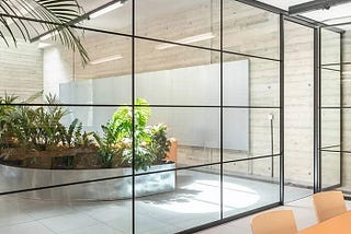 The Elegance and Practicality of Glass Partitions: Redefining Interior Spaces