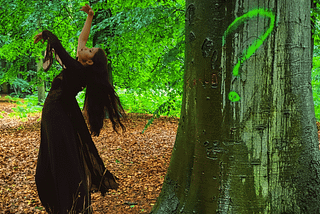 Background: Vibrant green forest trees and a woman (witch) dancing in a black dress. Foreground: Tree trunk with a green spray painted question mark. Why Your Core Beliefs Matter More Than Your Spells. Statement of Core Beliefs Digital Book of Shadows Notions Template Gem Blackthorn.
