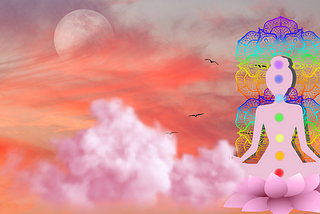 Pink hues surrounding the full moon, pink clouds in the foreground with pink female silhouette in meditation pose with chakra symbols