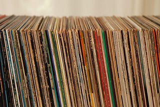 stack of vinyl albums