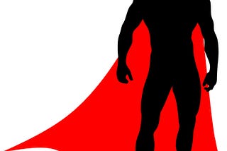 Silhouette of man with red cape portraying an unidentified superhero