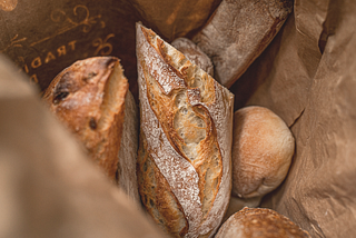 Fresh-Baked and In-House: Here’s Why Your Grocery Store’s Bread is Wrapped in Paper Instead of…