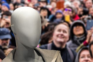 A faceless image in the midst of a crowd of people