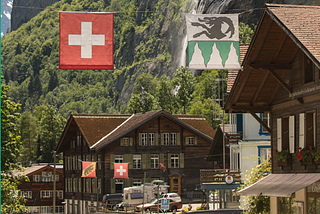 picture of Swiss village complete with the Swiss flag