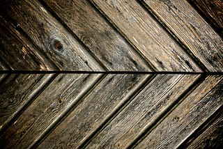 Lines on wood suggesting progress