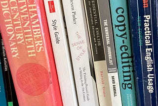 A bookshelf showing some of the writer’s source books, including The Economist Style Guide, Steven Pinker’s ‘The Sense of Style’, ‘The Universal Journalist’ by David Randall and titles on copy-editing and Practical English Usage.