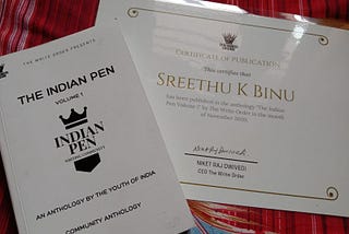 Indian Pen anthology along with publication certificate.