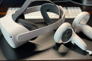 An Oculus Quest 2 headset with its two controllers