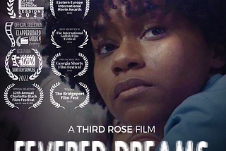 Promotional poster for the short film Fevered Dreams written and directed by L.M. Davis. Features a Black woman with dark curly hair, looking to the left of the camera.