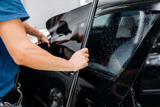When to Roll Down Windows After Tinting?