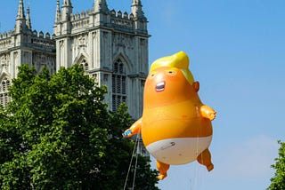 Donald Trump is depicted as a baby in diapers, in a parade balloon in London. Photo by Dave Lowe on Unsplash