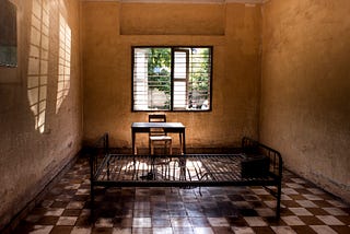 Tuol Sleng Photographs: Escaping the Archive